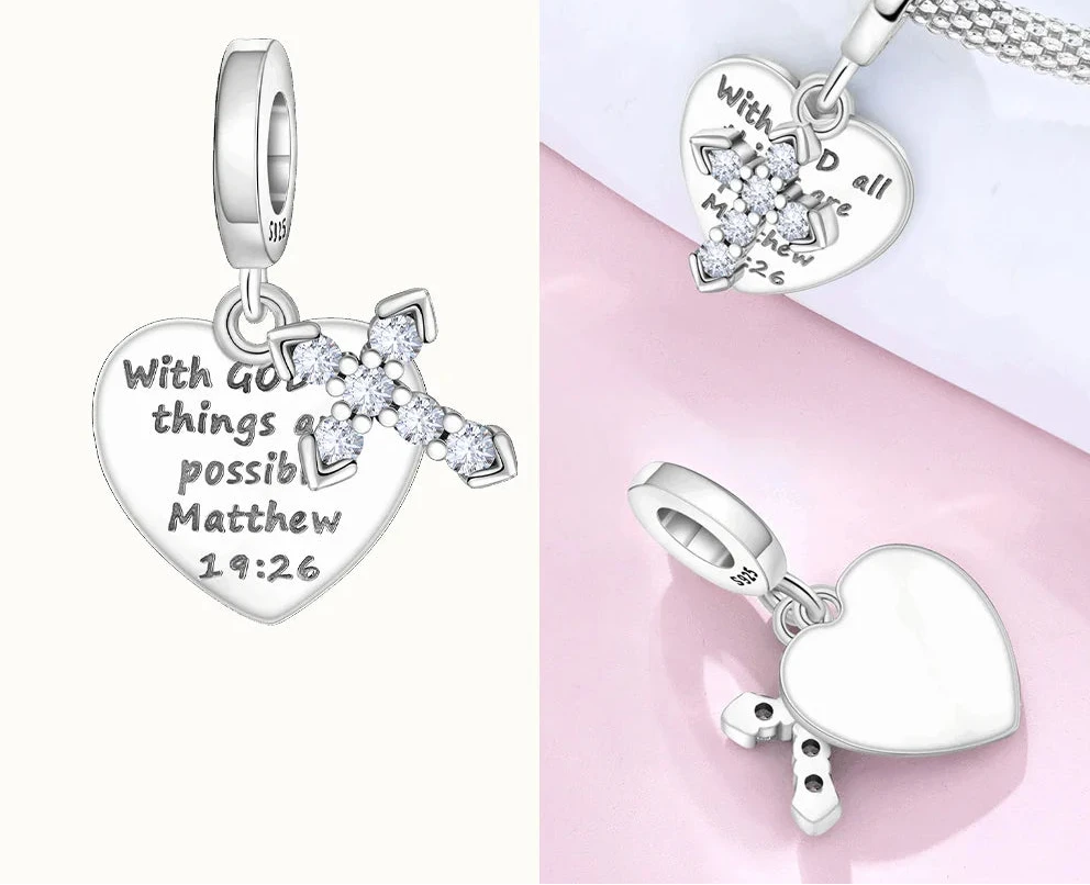 Silver heart-shaped pendants with engraved text on a white background, 