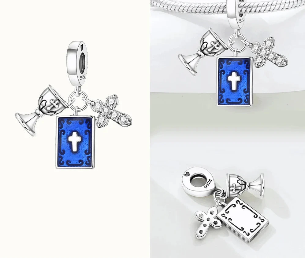 Jewelry charms with religious symbols on a white background, 