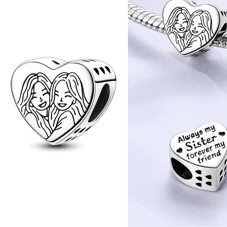 Heart-shaped silver charm with engraved design and 'Always my Sister forever my friend' text on a white background.
